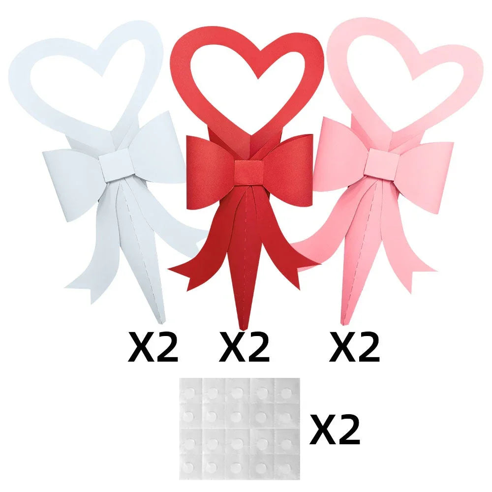 Three heart-shaped paper bows in white, red, and pink with adhesive dots, gift wrap set BYSHOPIMA