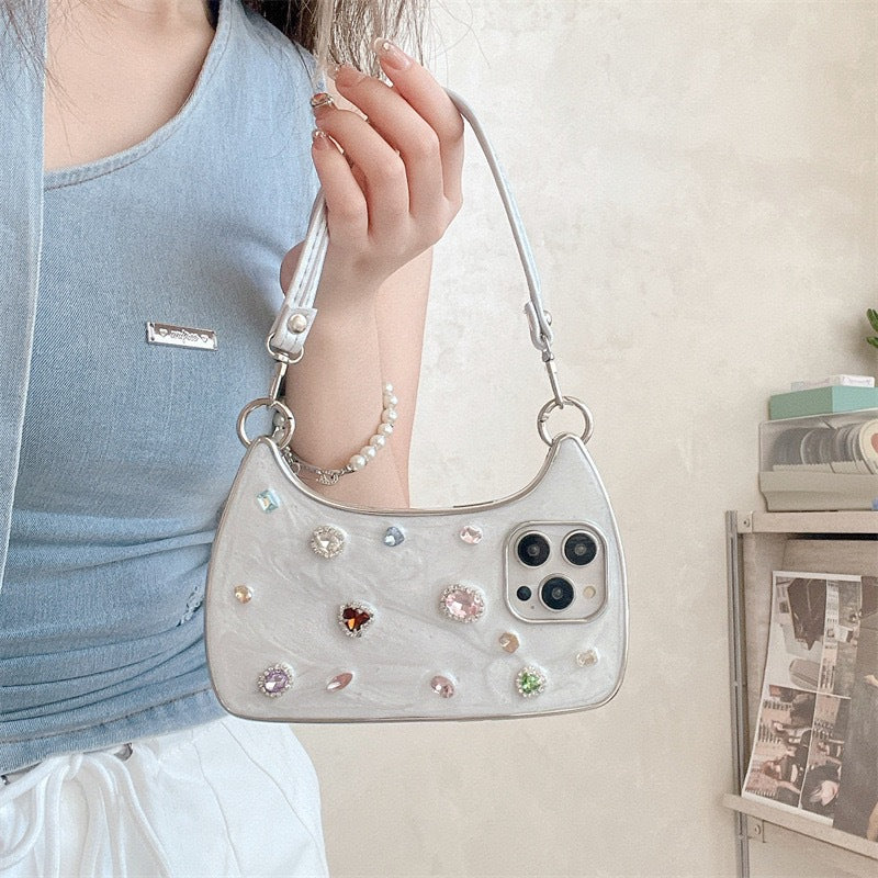 ETUI TELEPHONE ORNE EN DIAMANTS ET PIERRES