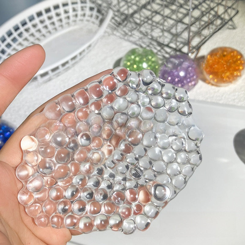 BALLE ANTI-STRESS SENSORIELLE TRANSPARENTE