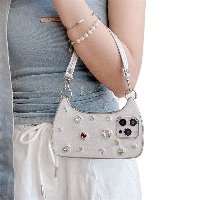 ETUI TELEPHONE ORNE EN DIAMANTS ET PIERRES